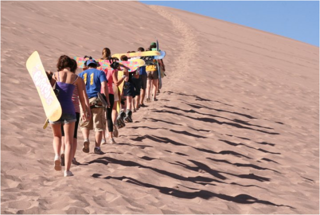Climbing up sand dune